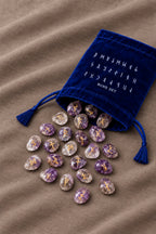 Runenset aus Amethyststein